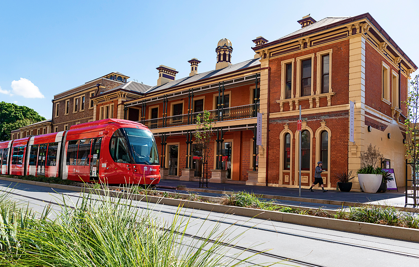 Light rail passing The Station Newcastle